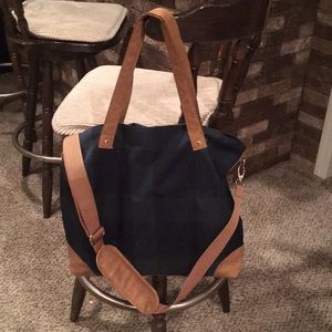 Large hunter green and navy tartan crossbody bag.